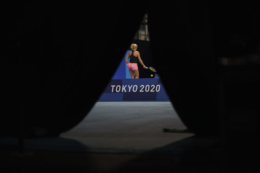 Katerina Siniakova, of the Czech Republic, practices at the Ariake Tennis Center at the 2020 Summer Olympics, Tuesday, July 20, 2021, in Tokyo. (AP Photo/David Goldman)
