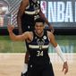 Milwaukee Bucks forward Giannis Antetokounmpo (34) reacts during the second half of Game 6 of basketball&#39;s NBA Finals against the Phoenix Suns in Milwaukee, Tuesday, July 20, 2021. (AP Photo/Paul Sancya)