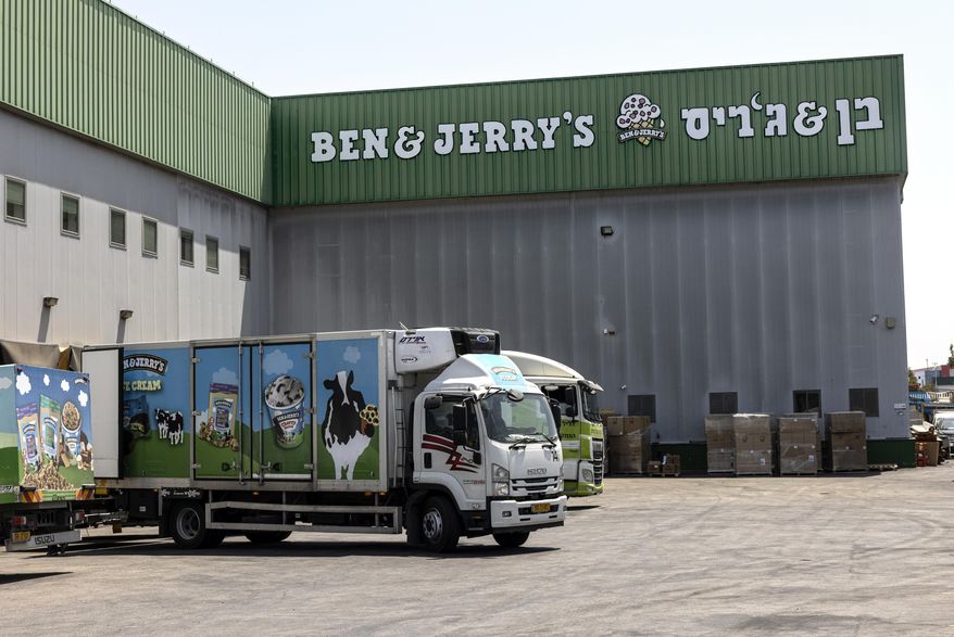 Trucks are parked at the Ben &amp; Jerry&#x27;s ice-cream factory in the Be&#x27;er Tuvia Industrial area in Israel in this Tuesday, July 20, 2021, in this file photo. (AP Photo/Tsafrir Abayov)  **FILE**