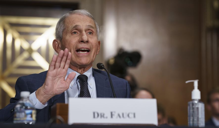 Top infectious disease expert Dr. Anthony Fauci pushes back on statements by Sen. Rand Paul, R-Ky., as he testifies before the Senate Health, Education, Labor, and Pensions Committee on Capitol Hill in Washington, Tuesday, July 20, 2021. Cases of COVID-19 have tripled over the past three weeks, and hospitalizations and deaths are rising among unvaccinated people. (AP Photo/J. Scott Applewhite, Pool)