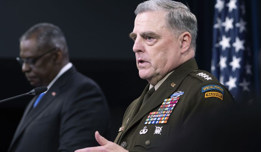 Joint Chiefs Chairman Gen. Mark Milley, right, speaks at a press briefing at the Pentagon with Defense Secretary Lloyd Austin, Wednesday, July 21, 2021, in Washington. (AP Photo/Kevin Wolf) ** FILE **