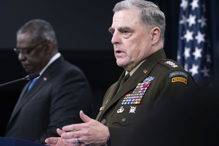 Joint Chiefs Chairman Gen. Mark Milley, right, speaks at a press briefing at the Pentagon with Defense Secretary Lloyd Austin, Wednesday, July 21, 2021, in Washington. (AP Photo/Kevin Wolf) ** FILE **