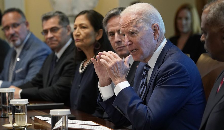 President Joe Biden speaks during a meeting with his Cabinet in the Cabinet Room at the White House in Washington, Tuesday, July 20, 2021. From left, Secretary of Education Miguel Cardona, Secretary of Health and Human Services Xavier Becerra, Secretary of the Interior Deb Haaland, Secretary of State Antony Blinken, Biden and Secretary of Defense Lloyd Austin. (AP Photo/Susan Walsh)