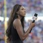 FILE - In this Aug. 24, 2019, file photo, ESPN&#39;s Maria Taylor works from the sideline during the first half of an NCAA college football game between Miami and Florida in Orlando, Fla. Taylor is leaving ESPN after the two sides were unable to reach an agreement on a contract extension. Taylor had been with ESPN since 2014 but her contract expired Tuesday, July 20, 2021. Her last assignment for the network was Tuesday night at the NBA Finals, where she was the pregame and postgame host for the network&#39;s “NBA Countdown” show.  (AP Photo/Phelan M. Ebenhack, File)