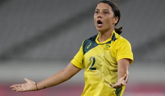 Australia&#39;s Sam Kerr celebrates after scoring her side&#39;s second goal during a women&#39;s soccer match against New Zealand at the 2020 Summer Olympics, Wednesday, July 21, 2021, in Tokyo. (AP Photo/Ricardo Mazalan)