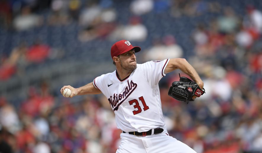 Washington Nationals starting pitcher Max Scherzer delivers a pitch during a baseball game against the San Diego Padres, Sunday, July 18, 2021, in Washington. (AP Photo/Nick Wass)