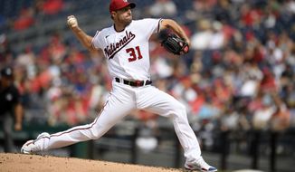 Washington Nationals starter Max Scherzer delivers a pitch during the third inning of the team&#39;s baseball game against the San Diego Padres, Sunday, July 18, 2021, in Washington. (AP Photo/Nick Wass)