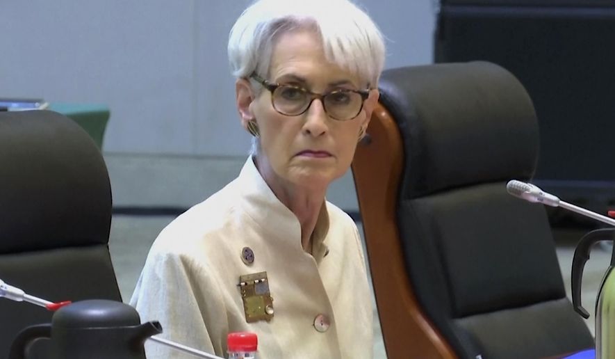 In this image taken from a July 26, 2021, video footage run by Phoenix TV via AP Video, U.S. Deputy Secretary of State Wendy Sherman looks up before talks with Chinese officials at the Tianjin Binhai No. 1 Hotel in the Tianjin municipality in China. (Phoenix TV via AP Video)