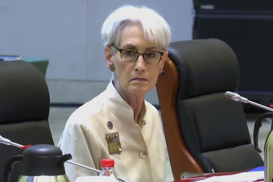 In this image taken from a July 26, 2021, video footage run by Phoenix TV via AP Video, U.S. Deputy Secretary of State Wendy Sherman looks up before talks with Chinese officials at the Tianjin Binhai No. 1 Hotel in the Tianjin municipality in China. (Phoenix TV via AP Video)