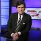 In this Thursday, March 2, 2017, photo, Tucker Carlson, host of &quot;Tucker Carlson Tonight,&quot; poses for a photo in a Fox News Channel studio in New York. (AP Photo/Richard Drew) **FILE**