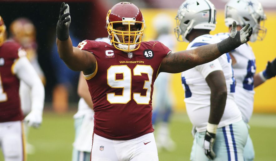FILE - Washington Football Team defensive tackle Jonathan Allen (93) gestures during an NFL football game against the Dallas Cowboys in Landover, Md., in this Sunday, Oct. 25, 2020, file photo. Washington signed star defensive tackle Jonathan Allen on the eve of training camp to a $72 million, four-year contract extension with a $30 million signing bonus. Allen&#x27;s agency, Team IFA, announced the terms of the deal in a Twitter post Monday, July 26, 2021. (AP Photo/Daniel Kucin Jr., File)