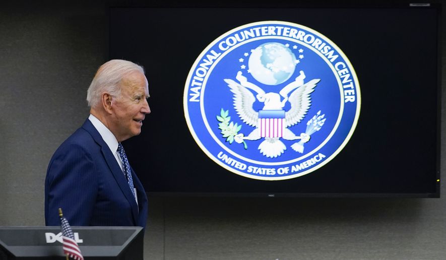President Joe Biden visits the Office of the Director of National Intelligence in McLean, Va., Tuesday, July 27, 2021.  (AP Photo/Susan Walsh)
