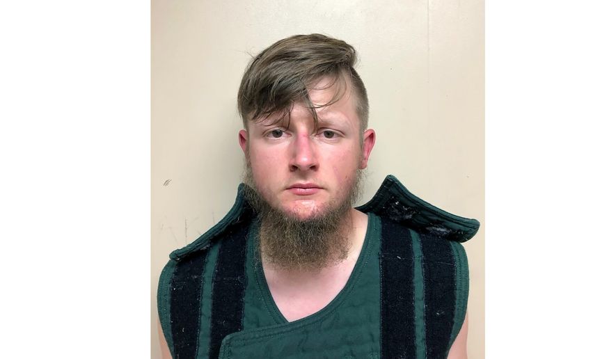 This March 16, 2021, booking photo provided by the Crisp County, Ga., Sheriff&#x27;s Office shows Robert Aaron Long. (Crisp County Sheriff&#x27;s Office via AP, File)