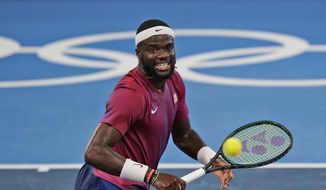 Frances Tiafoe, of the United States, plays Stefanos Tsitsipas, of Greece, during the second round of the tennis competition at the 2020 Summer Olympics, Tuesday, July 27, 2021, in Tokyo, Japan. (AP Photo/Seth Wenig) **FILE**