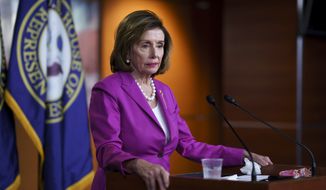 Speaker of the House Nancy Pelosi, D-Calif., talks to reporters at the Capitol in Washington, Wednesday, July 28, 2021, the day after the first hearing by her select committee on the Jan. 6 attack. (AP Photo/J. Scott Applewhite)