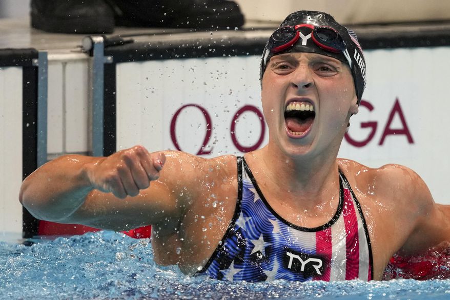 Katie Ledecky, of the United States, reacts after winning the women&#39;s 1500-meters freestyle final at the 2020 Summer Olympics, Wednesday, July 28, 2021, in Tokyo, Japan. (AP Photo/Matthias Schrader)