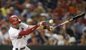 Washington Nationals&#39; Trea Turner fouls off a pitch during the eighth inning of the team&#39;s baseball game against the Miami Marlins, Wednesday, July 21, 2021, in Washington. The Marlins won 3-1. (AP Photo/Nick Wass) **FILE**