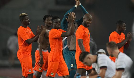 Ivory Coast players leave the pitch after a men&#39;s soccer match against Germany at the 2020 Summer Olympics, Wednesday, July 28, 2021, in Rifu, Japan. The match ended tied 1-1.(AP Photo/Andre Penner)