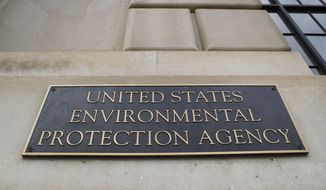 In this Sept. 21, 2017, file photo, the Environmental Protection Agency (EPA) Building is shown in Washington. Two high-ranking Trump political appointees at the EPA engaged in fraudulent payroll activities, including payments to employees after they were fired and to one of the officials when he was absent from work, that cost the agency more than $130,000, a report by an internal watchdog says. Former chief of staff Ryan Jackson and former White House liaison Charles Munoz submitted “official timesheets and personnel forms that contained materially false, fictitious, and fraudulent statements&amp;quot; to mislead EPA personnel and facilitate improper payments over multiple months, according to a report by EPA’s Office of Inspector General.  (AP Photo/Pablo Martinez Monsivais, File)