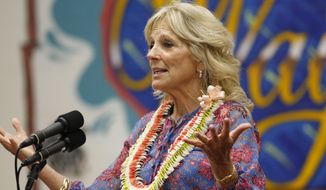 First lady Jill Biden speaks after touring a COVID-19 vaccination clinic at a high school in Waipahu, Hawaii, Sunday, July 25, 2021. (AP Photo/Caleb Jones)