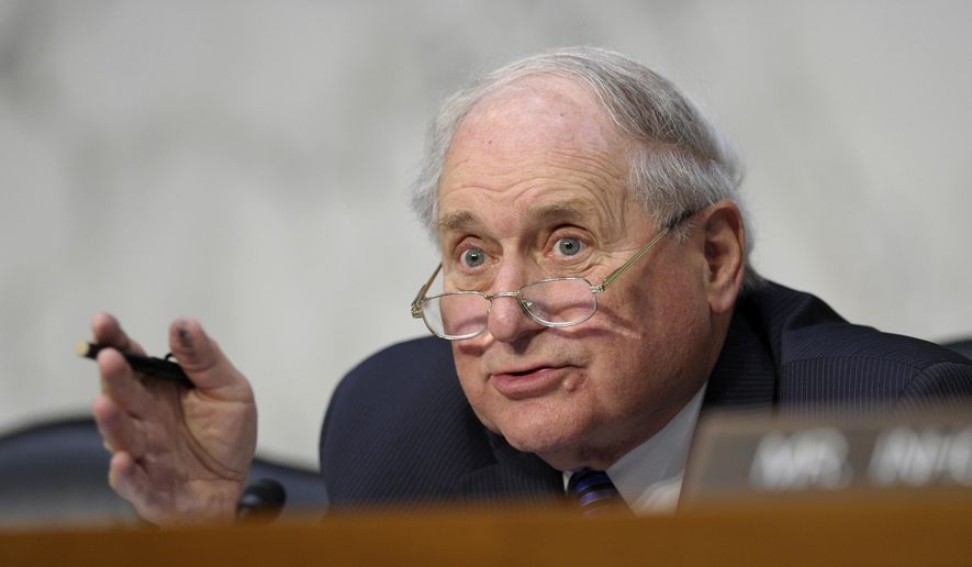 In this June 4, 2013, file photo, Senate Armed Services Committee Chairman Sen. Carl Levin, D-Mich. asks a question of a witness during a hearing on Capitol Hill in Washington on legislation regarding sexual assaults in the military. Levin, a powerful voice for the military during his career as Michigan’s longest-serving U.S. senator, has died. The Democrat was 87. Levin’s family says Levin died Thursday, July 29, 2021. (AP Photo/Susan Walsh, File)