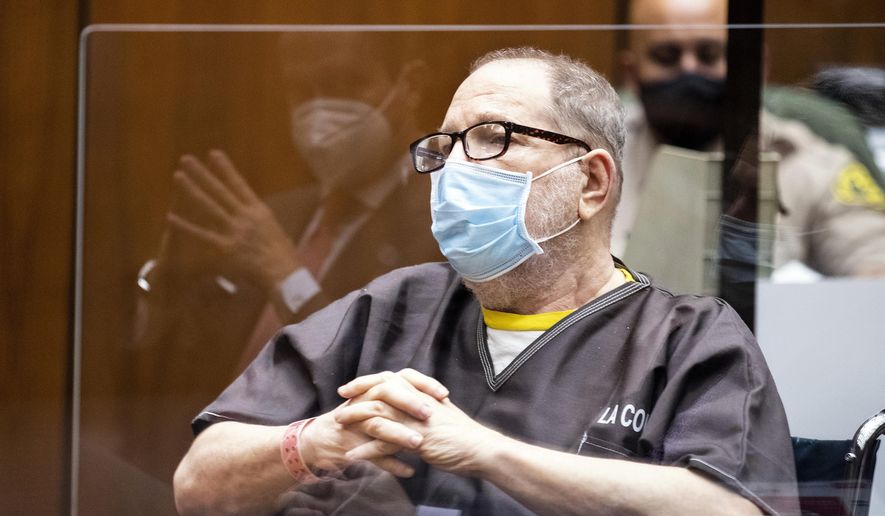 Harvey Weinstein, a convicted rapist and disgraced movie mogul, wears a face mask as he listens in court during a pre-trial hearing in Los Angeles, Thursday, July 29, 2021. Weinstein pleaded not guilty Wednesday to four counts of rape and seven other sexual assault counts in California. (Etienne Laurent/Pool Photo via AP) ** FILE **