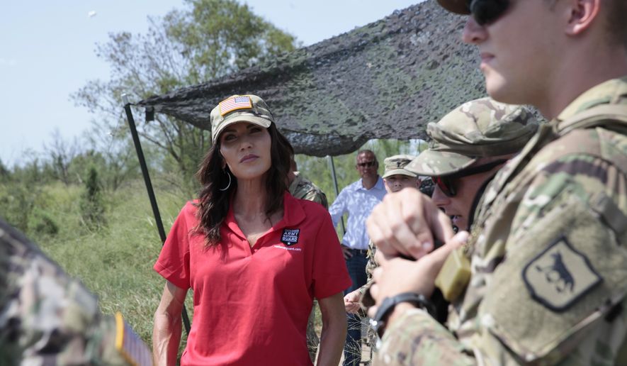 South Dakota Gov. Kristi Noem visits the U.S. border with Mexico on Monday, July 26, 2021, near McAllen, Texas. The Republican governor deployed roughly 50 National Guard troops to help with Texas’ push to arrest people crossing illegally and charge them with state crimes. (AP Photo/Stephen Groves)