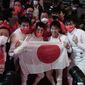 Japan team celebrate after winning a men&#39;s Epee team final at the 2020 Summer Olympics, Friday, July 30, 2021, in Chiba, Japan. (AP Photo/Andrew Medichini)