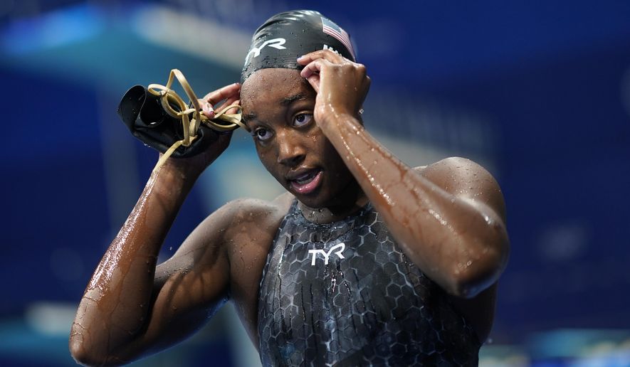 Simone Manuel, of United States, leaves the pool after a women&#39;s 50-meter freestyle semifinal at the 2020 Summer Olympics, Saturday, July 31, 2021, in Tokyo, Japan. (AP Photo/David Goldman)