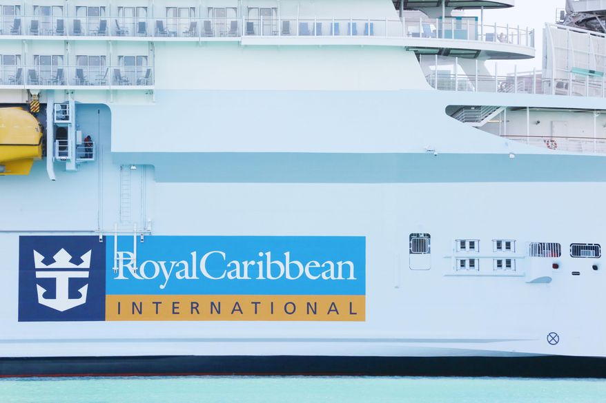 In this March 14, 2020, photo, a Royal Caribbean International cruise ship docks at PortMiami in Miami. (AP Photo/Brynn Anderson) **FILE**