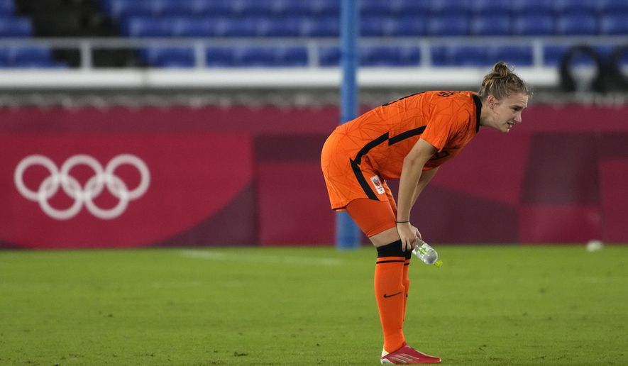Netherlands&#39; Vivianne Miedema reacts after loosing in a penalty shootout against United States during a women&#39;s quarterfinal soccer match at the 2020 Summer Olympics, Friday, July 30, 2021, in Yokohama, Japan. (AP Photo/Kiichiro Sato)