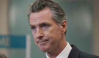 In this July 26, 2021 file photo Gov. Gavin Newsom speaks at a news conference in Oakland, Calif. California could witness a stunning turnabout if voters dump Newsom and elects a Republican to fill his job in a the September recall election. (AP Photo/Jeff Chiu, File)
