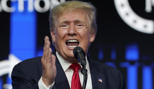 In this July 24, 2021, file photo, former President Donald Trump speaks on a variety of topics to supporters at a Turning Point Action gathering in Phoenix. (AP Photo/Ross D. Franklin) ** FILE **