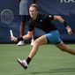 Sebastian Korda chases down the ball against Vasek Pospisil, of Canada, during a match in the Citi Open tennis tournament, Tuesday, Aug. 3, 2021, in Washington. (AP Photo/Nick Wass) **FILE**