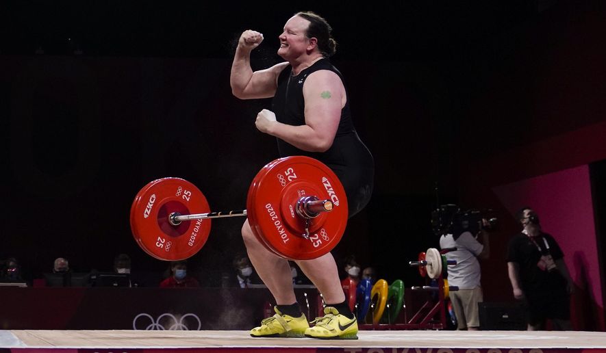 Laurel Hubbard of New Zealand reacts after a lift in the women&#x27;s +87kg weightlifting event at the 2020 Summer Olympics, Monday, Aug. 2, 2021, in Tokyo, Japan. (AP Photo/Seth Wenig)