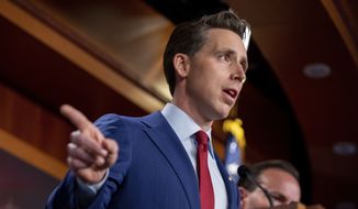 Sen. Josh Hawley, R-Mo., alongside other Senate Republicans, speaks to members of the media on Capitol Hill in Washington, about funding for the Infrastructure Investment and Jobs Act on Wednesday, Aug. 4, 2021. (AP Photo/Amanda Andrade-Rhoades) ** FILE **