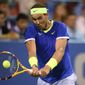 Rafael Nadal, of Spain, returns a shot against Jack Sock during a match in the Citi Open tennis tournament, Wednesday, Aug. 4, 2021, in Washington. Nadal won 6-2, 4-6, 7-6 (1). (AP Photo/Nick Wass)