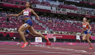 Sydney McLaughlin, of the United States, wins the women&#39;s 400-meter hurdles final at the 2020 Summer Olympics, Wednesday, Aug. 4, 2021, in Tokyo, Japan. (AP Photo/Petr David Josek)