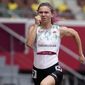In this file photo taken on Friday, July 30, 2021, Krystsina Tsimanouskaya, of Belarus, runs in the women&#39;s 100-meter run at the 2020 Summer Olympics, Japan. A feud between Belarusian Olympic sprinter Tsimanouskaya and team officials that prompted her to seek refuge in Poland has again cast a spotlight on the repressive environment in the ex-Soviet nation, where authorities have unleashed a relentless crackdown on dissent. (AP Photo/Martin Meissner, File)