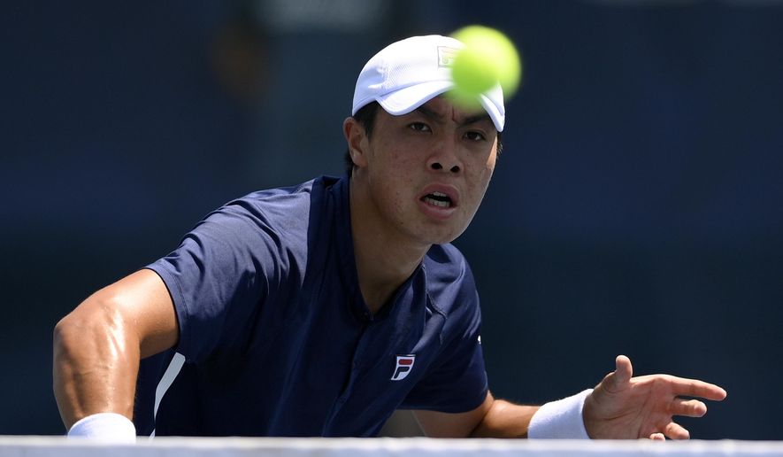 Brandon Nakashima competes against Daniel Evans, of England, during a match in the Citi Open tennis tournament, Wednesday, Aug. 4, 2021, in Washington. (AP Photo/Nick Wass)