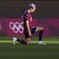 United States&#39; Megan Rapinoe kneels prior to the women&#39;s bronze medal soccer match against Australia at the 2020 Summer Olympics, Thursday, Aug. 5, 2021, in Kashima, Japan. (AP Photo/Fernando Vergara)