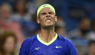 Rafael Nadal, of Spain, reacts during a match against Lloyd Harris, of South Africa, at the Citi Open tennis tournament Thursday, Aug. 5, 2021, in Washington. Harris won 6-4, 1-6, 6-4. (AP Photo/Nick Wass)