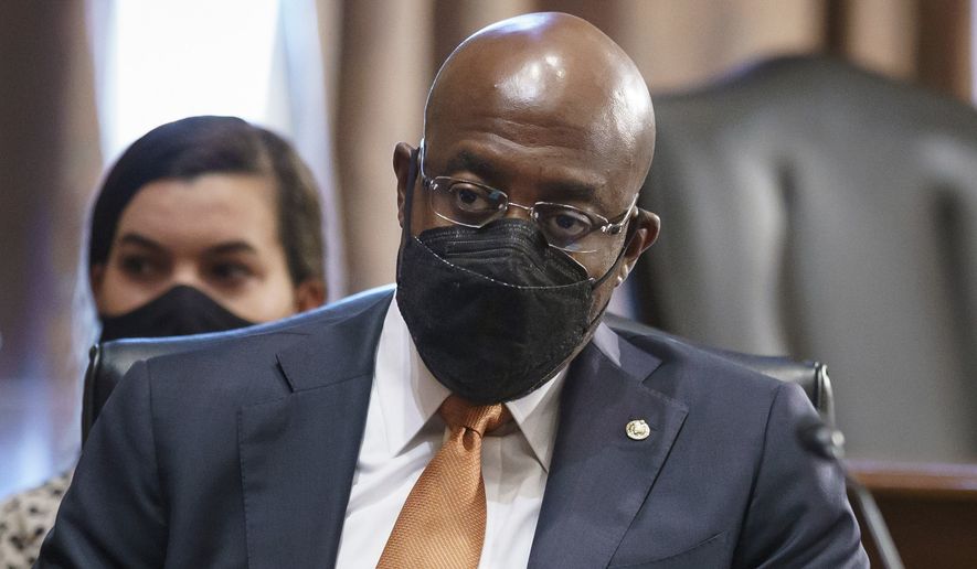 Sen. Raphael Warnock, D-Ga., a key figure on voting rights efforts, listens to testimony at a Senate Banking Committee hearing, at the Capitol in Washington, Thursday, Aug. 5, 2021. (AP Photo/J. Scott Applewhite) **FILE**