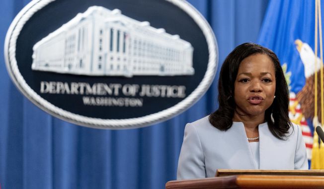 Assistant Attorney General for Civil Rights Kristen Clarke speaks at a news conference at the Department of Justice in Washington, Thursday, Aug. 5, 2021, to announce that the Department of Justice is opening an investigation into the city of Phoenix and the Phoenix Police Department. (AP Photo/Andrew Harnik) **FILE**
