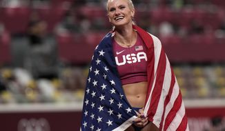 Gold medalist Katie Nageotte celebrates after winning the final of the women&#39;s pole vault at the 2020 Summer Olympics, Thursday, Aug. 5, 2021, in Tokyo.(AP Photo/Francisco Seco)