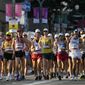 Athletes compete during the men&#39;s 50km race walk at the 2020 Summer Olympics, Friday, Aug. 6, 2021, in Sapporo, Japan. (AP Photo/Eugene Hoshiko)
