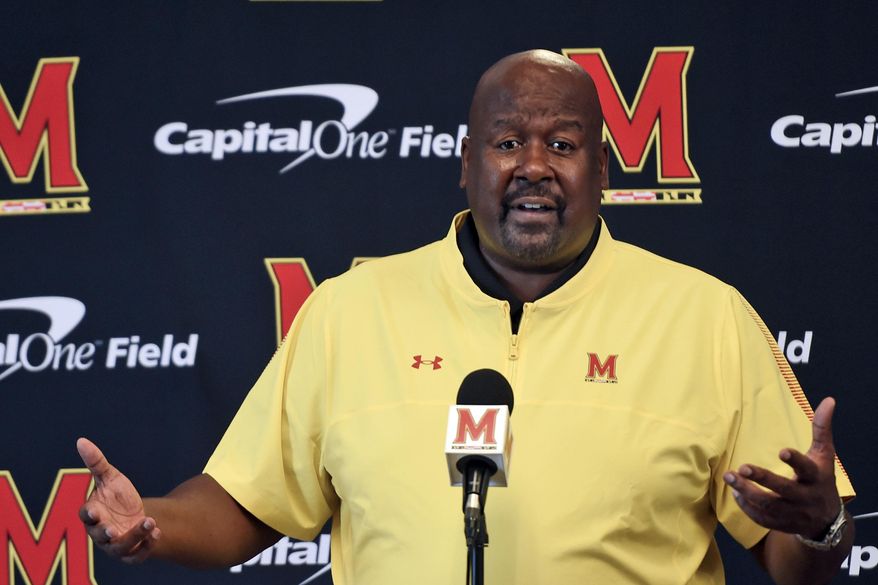 Maryland head coach Michael Locksley answers questions from reporters during an NCAA college football media day, Friday, Aug. 6, 2021, in College Park, Md. (AP Photo/Gail Burton) **FILE**