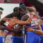 The team from the United States wins the women&#39;s 4 x 400-meter relay at the 2020 Summer Olympics, Saturday, Aug. 7, 2021, in Tokyo. (AP Photo/Matthias Schrader)