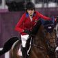 United States&#39; Jessica Springsteen, riding Don Juan van de Donkhoeve, competes in a jump-off during the equestrian jumping team final at Equestrian Park in Tokyo at the 2020 Summer Olympics, Saturday, Aug. 7, 2021, in Tokyo, Japan. (AP Photo/Carolyn Kaster)
