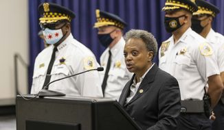 Mayor Lori Lightfoot speaks about the shooting of two police officers during a press conference at the Chicago Police Headquarters in Bronzeville to address the overnight shooting of two police officers during a traffic stop in West Englewood, Sunday, Aug. 8, 2021. (Anthony Vazquez/Chicago Sun-Times via AP)